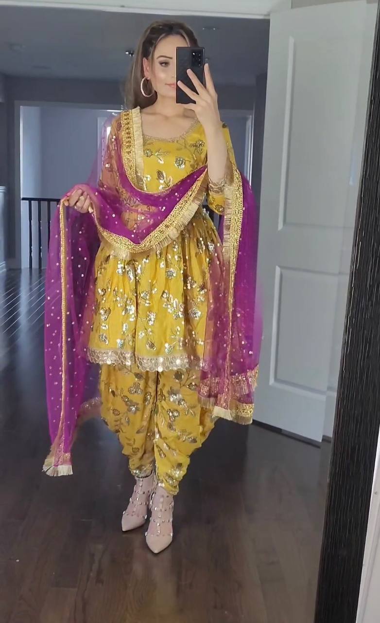 SHAFNUFAB YELLOW DHOTI SALWAR SUIT WITH DUPATTA