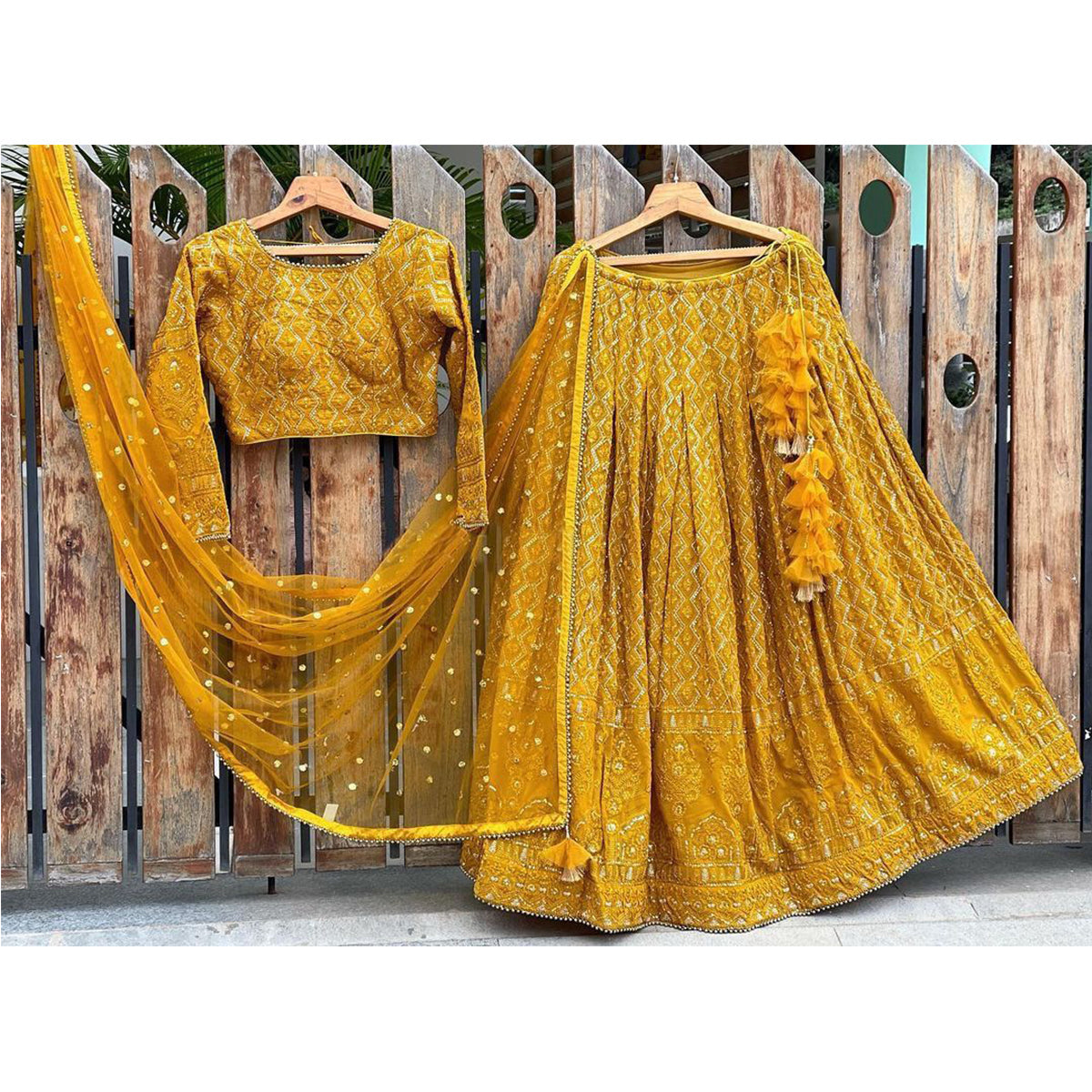 Shafnufab Women's Gorgette Lehenga Choli In Yellow Colour