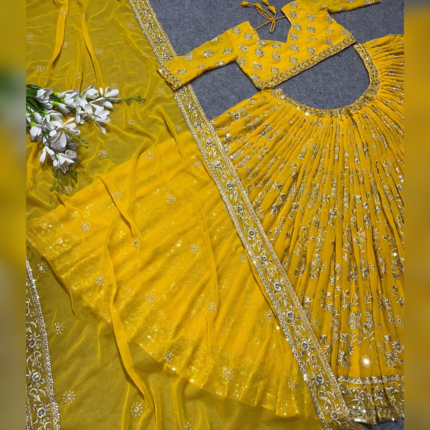 Shafnufab Women's Georgette Semi Stitched Lehenga Choli In Yellow Colour SF218188