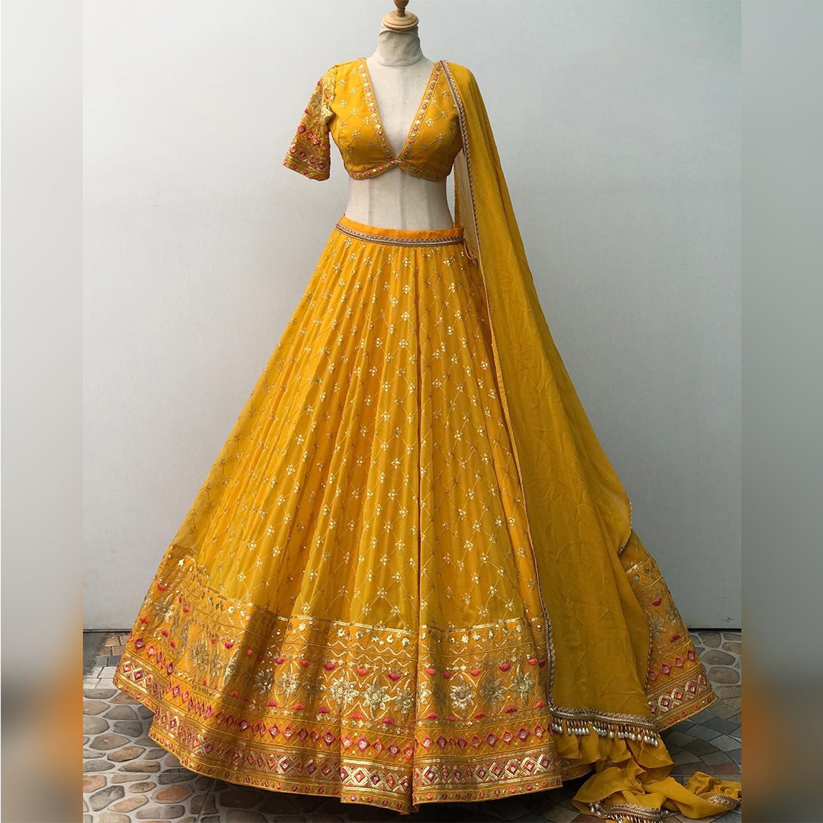 Shafnufab Women's Georgette Semi Stitched Lehenga Choli  In  Yellow  Colour SF218187